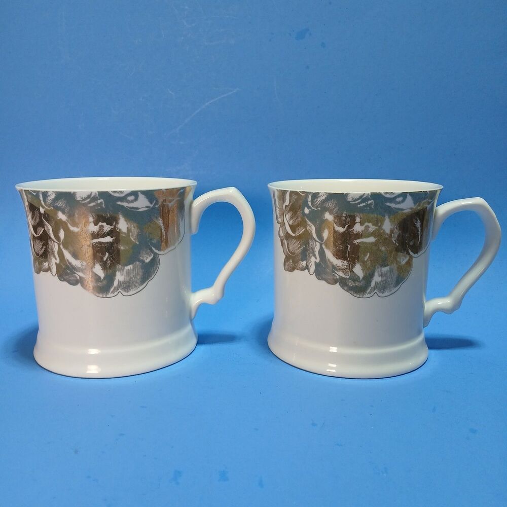 Nicole Miller Home Mugs, Set of 2, Gold Floral Design on White, 12 oz., EUC